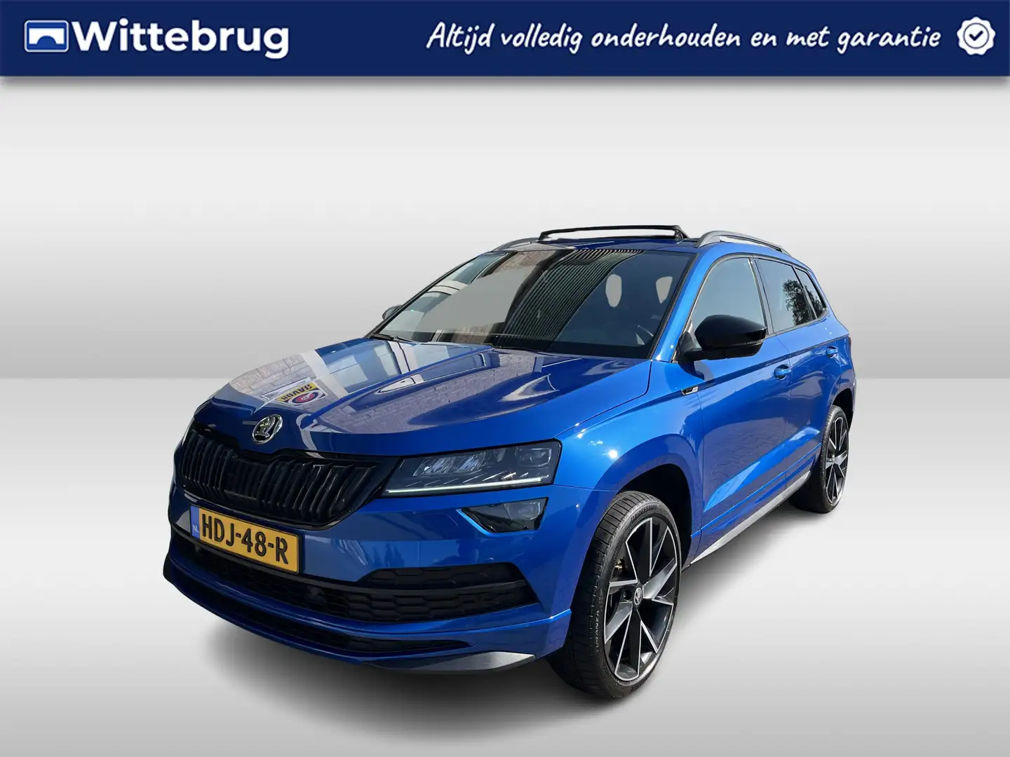 Skoda Karoq 1.5 TSI ACT Sportline Business / PANO/ KEYLESS/ DI Blauw - 1