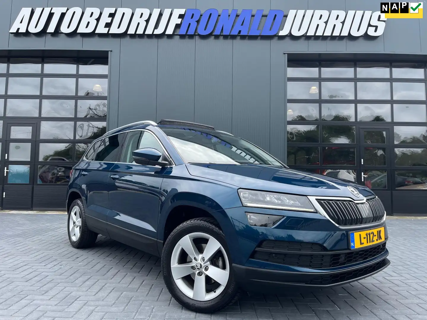 Skoda Karoq 1.0 TSI Business Edition Plus NL.Auto/Panoramadak/ Blau - 1