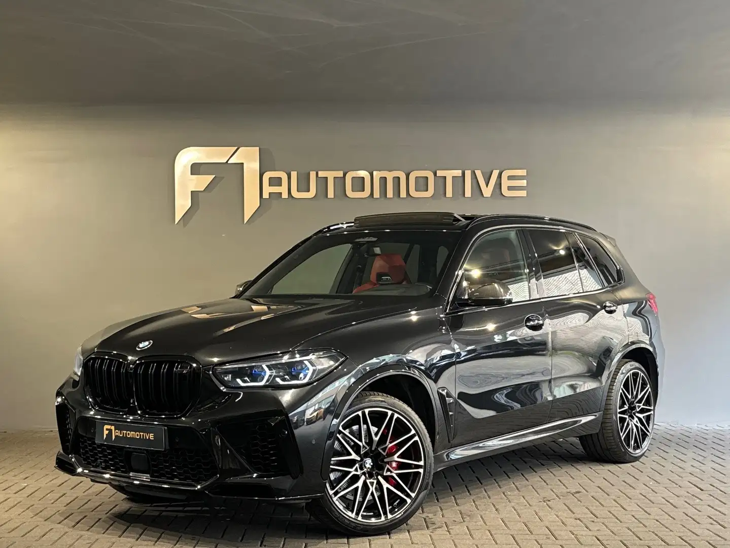 BMW X5 M Competition Pano|Carbon|B&W|Trekhaak|HuD|Massage Zwart - 1