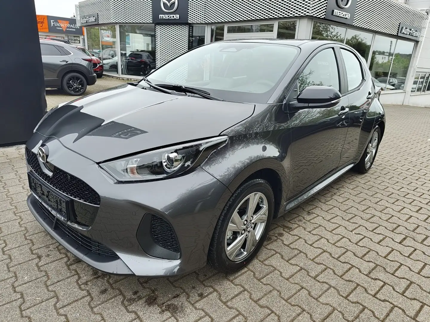 Mazda 2 Hybrid 2024 1.5L VVT-i e-CVT EXCLUSIVE-LINE Grau - 1