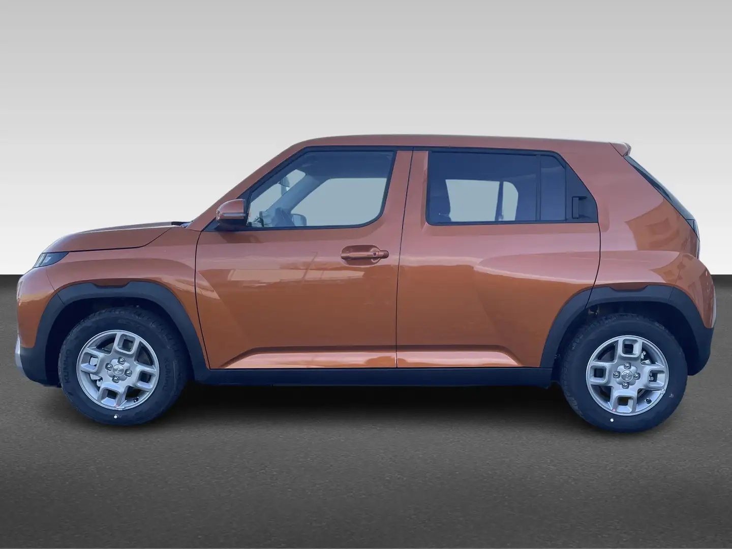 Hyundai Inster Pulse 49 kWh VAN: €29.085 VOOR: €25.585 . Pomarańczowy - 2