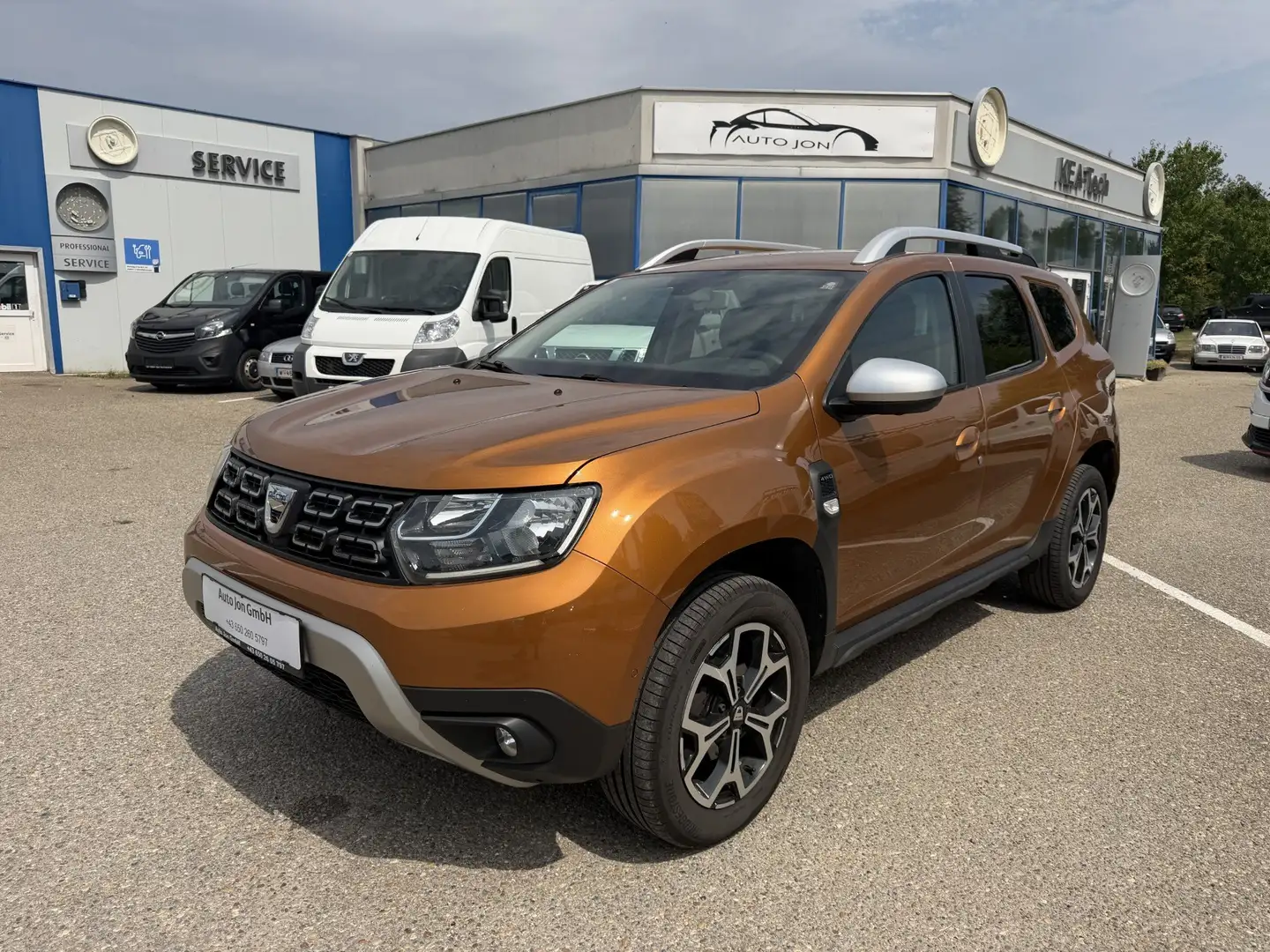 Dacia Duster Prestige 4WD*AHK*Tempomat*Sitzheizung*Navi*Klima* Orange - 1