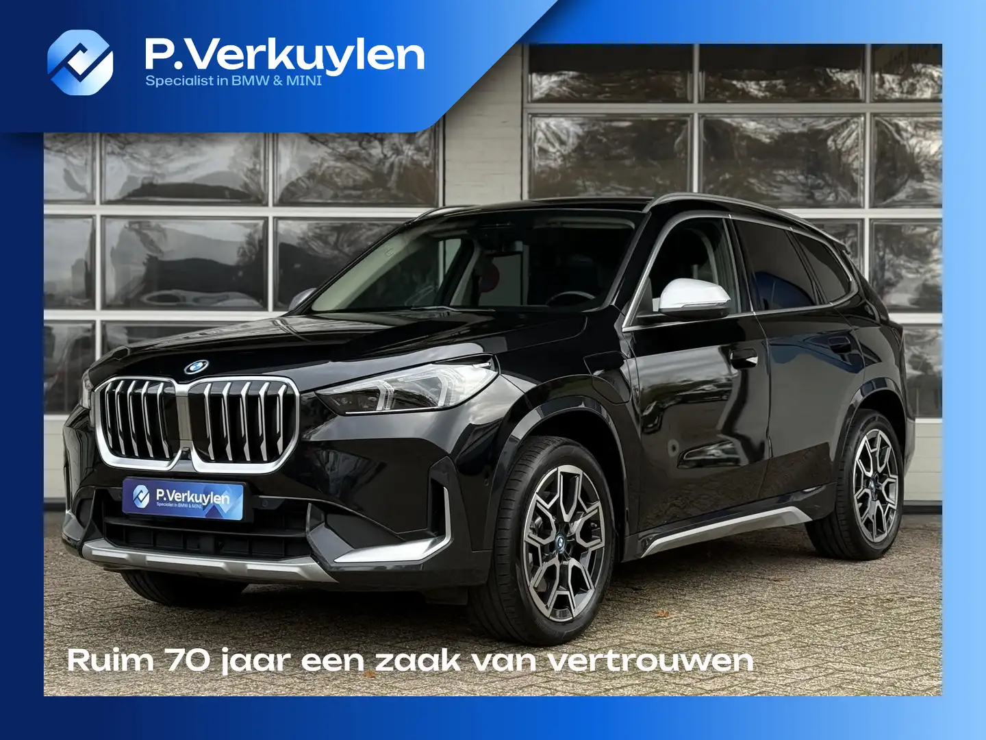 BMW X1 xDrive30e X LINE | DRIVING PROFF. | SPORTSTOELEN | Zwart - 1