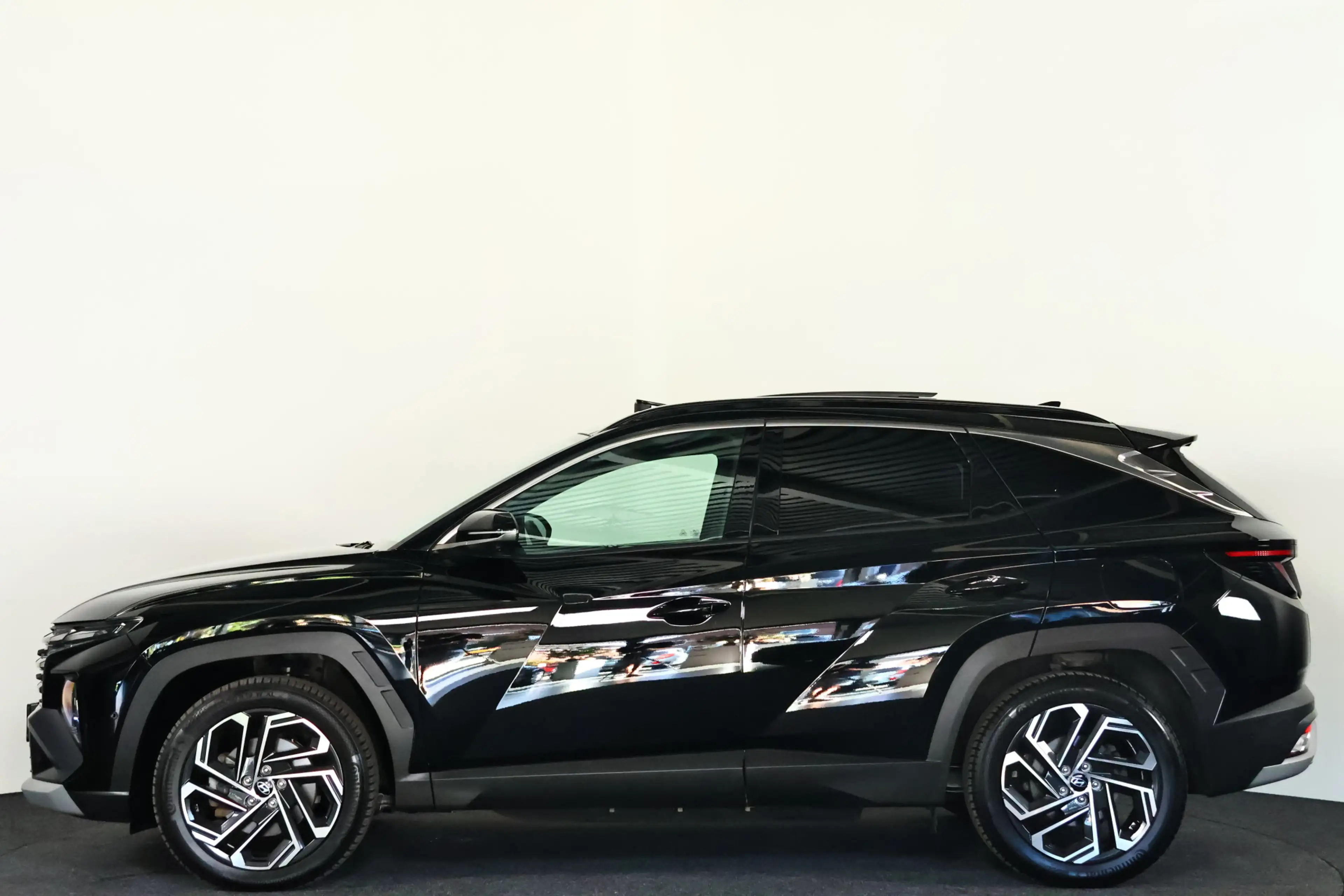 Hyundai TUCSON 1.6 T-GDI PHEV Premium Sky 4WD / Opendak / Leder / — photo 40