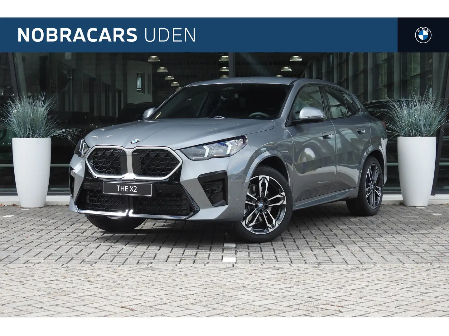 BMW X2 sDrive20i M Sport Automaat / Trekhaak / Sportstoel Grijs - 1