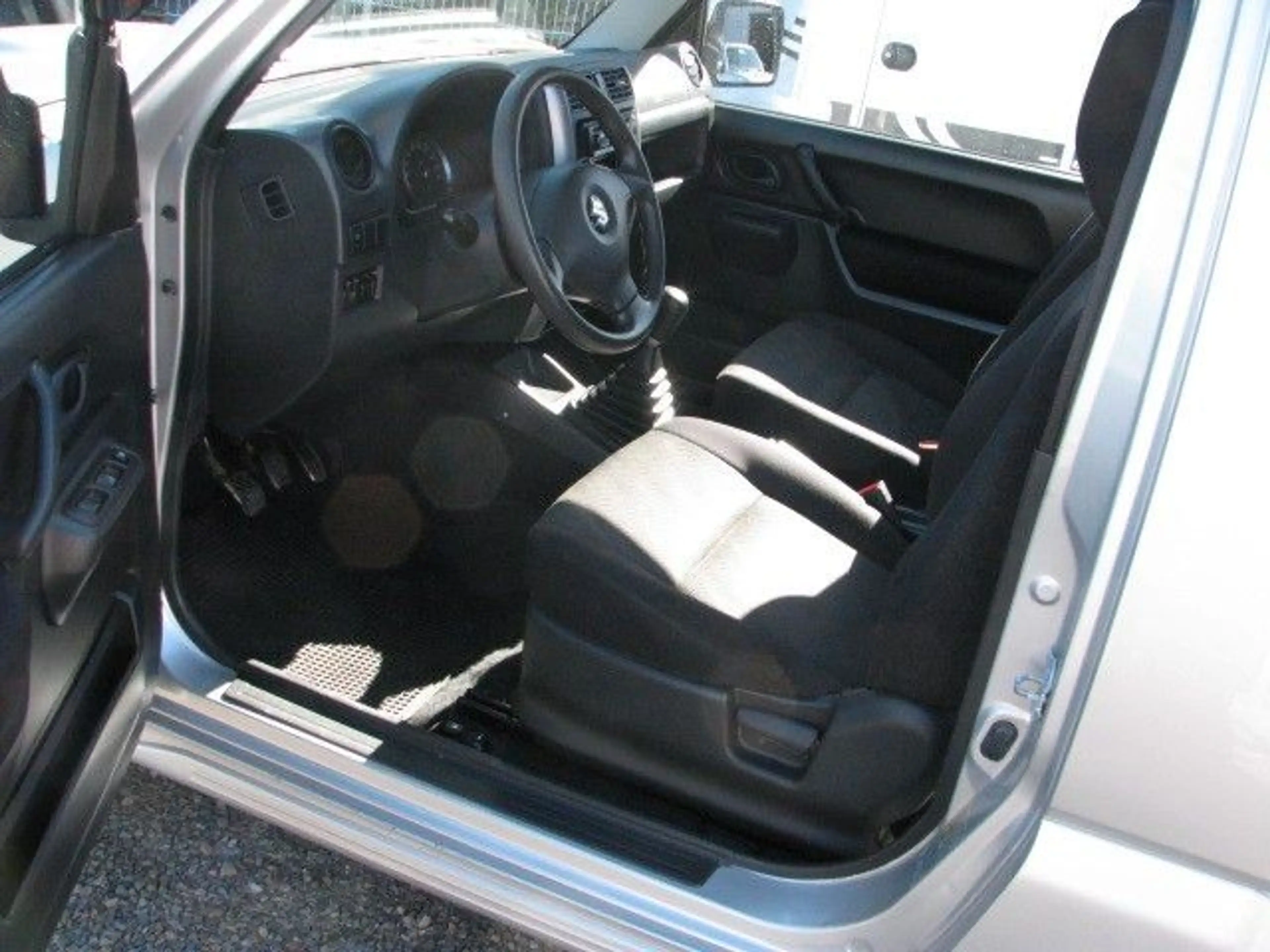 Suzuki Jimny 1.3 4WD "Silver Edition" — photo 20