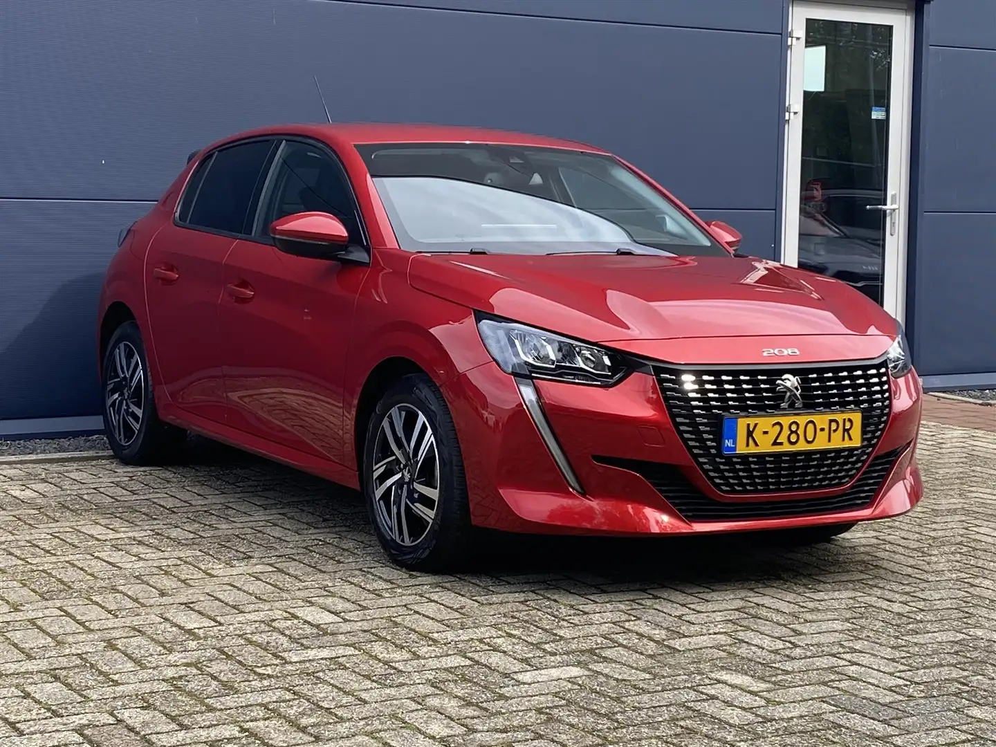 Peugeot 208 1.2 PureTech 100pk EAT8 Allure Pack | Navigatie | Rosso - 2