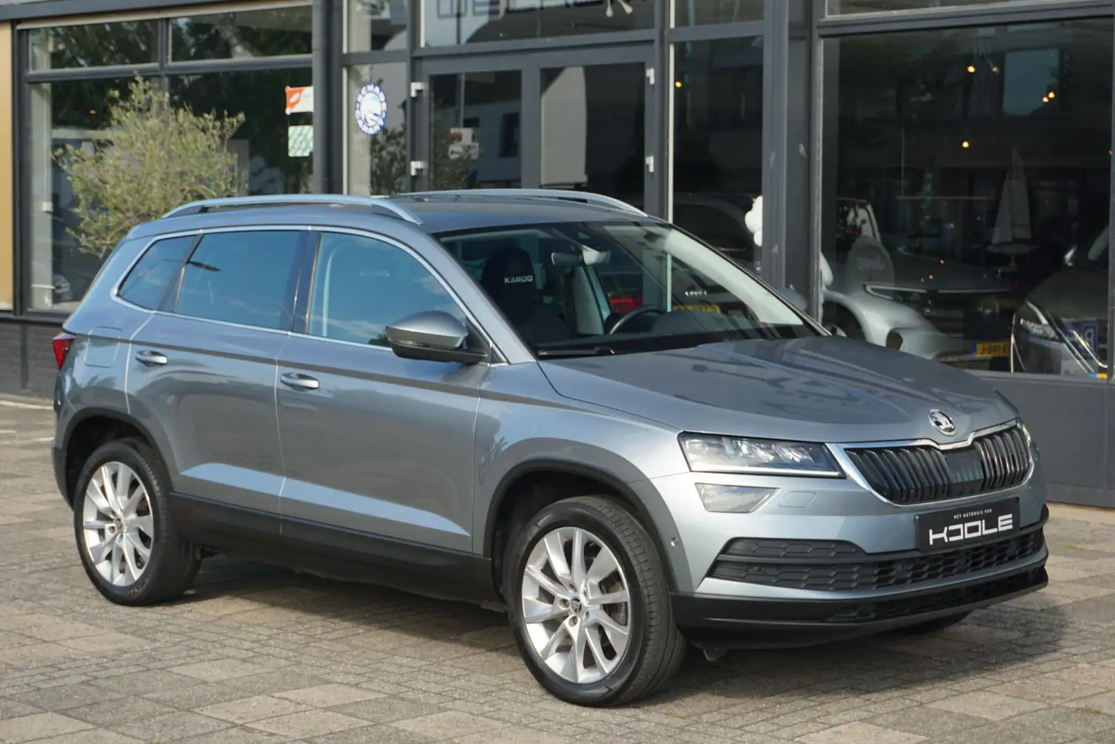 Skoda Karoq 1.5 TSI ACT Style | ACC | Trekhaak | Digitale cock Grijs - 1
