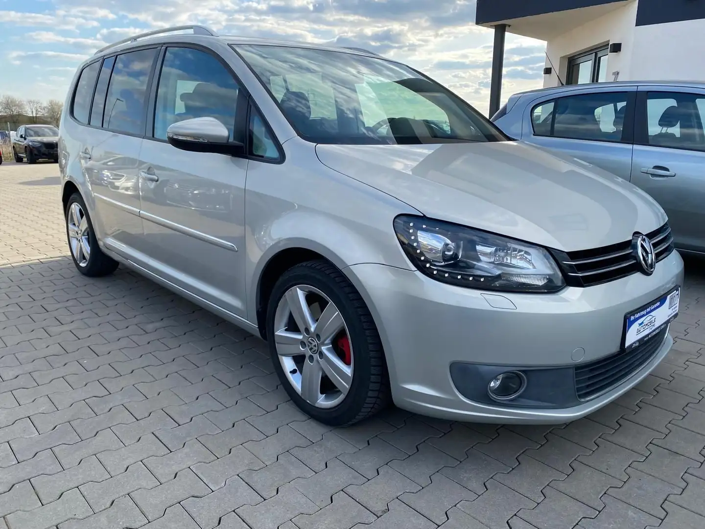 Volkswagen Touran HighlineIXenon/NAVI/7SITZE Silber - 1