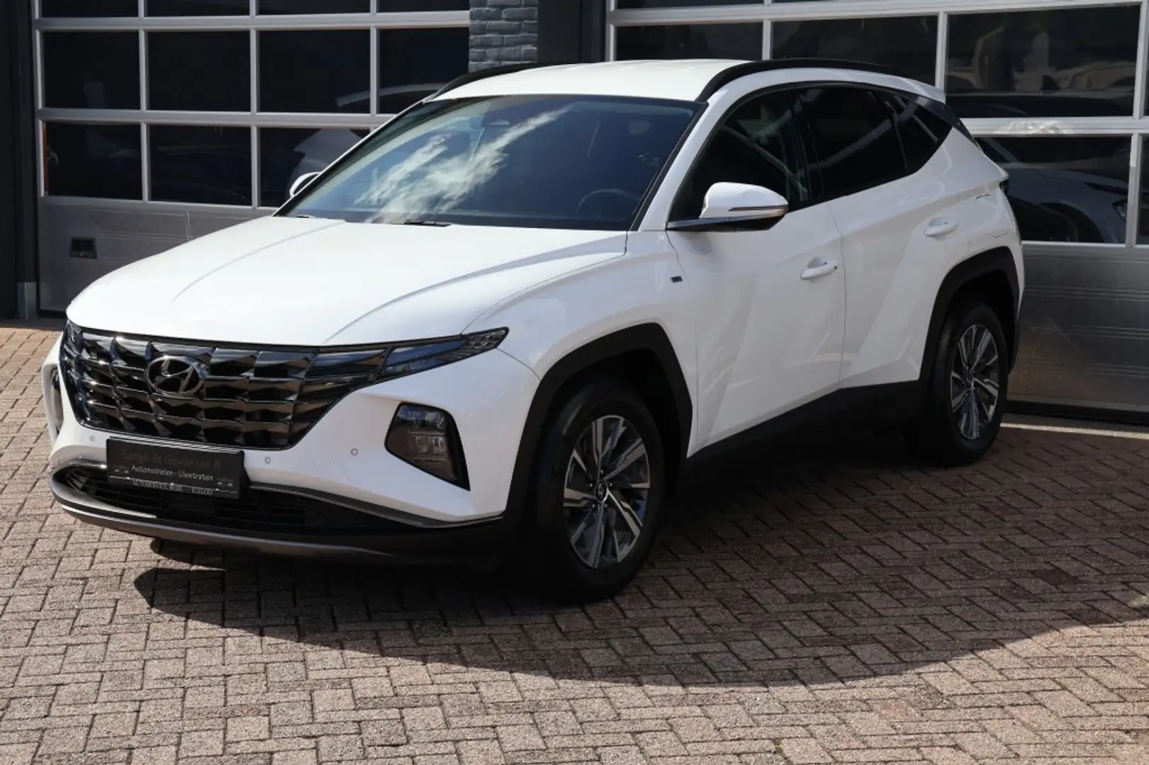Hyundai TUCSON 1.6 T-GDI MHEV 150 pk navigatie,camera, 37205 km Weiß - 1