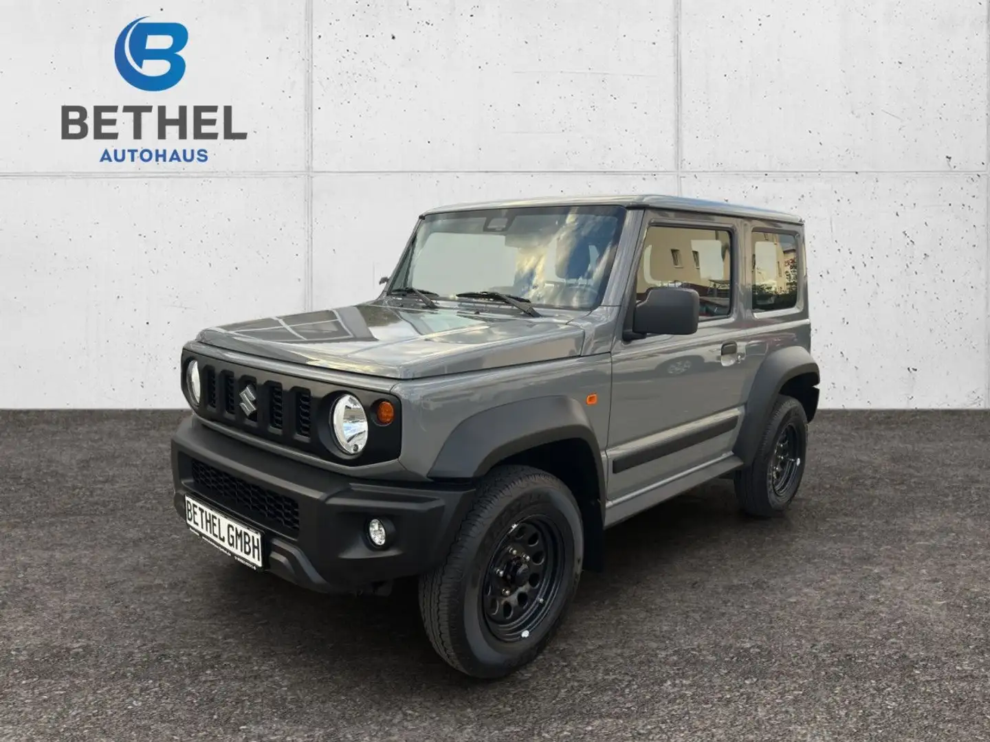 Suzuki Jimny 1.5 ALLGRIP Comfort Klima el. Fenster Gris - 1