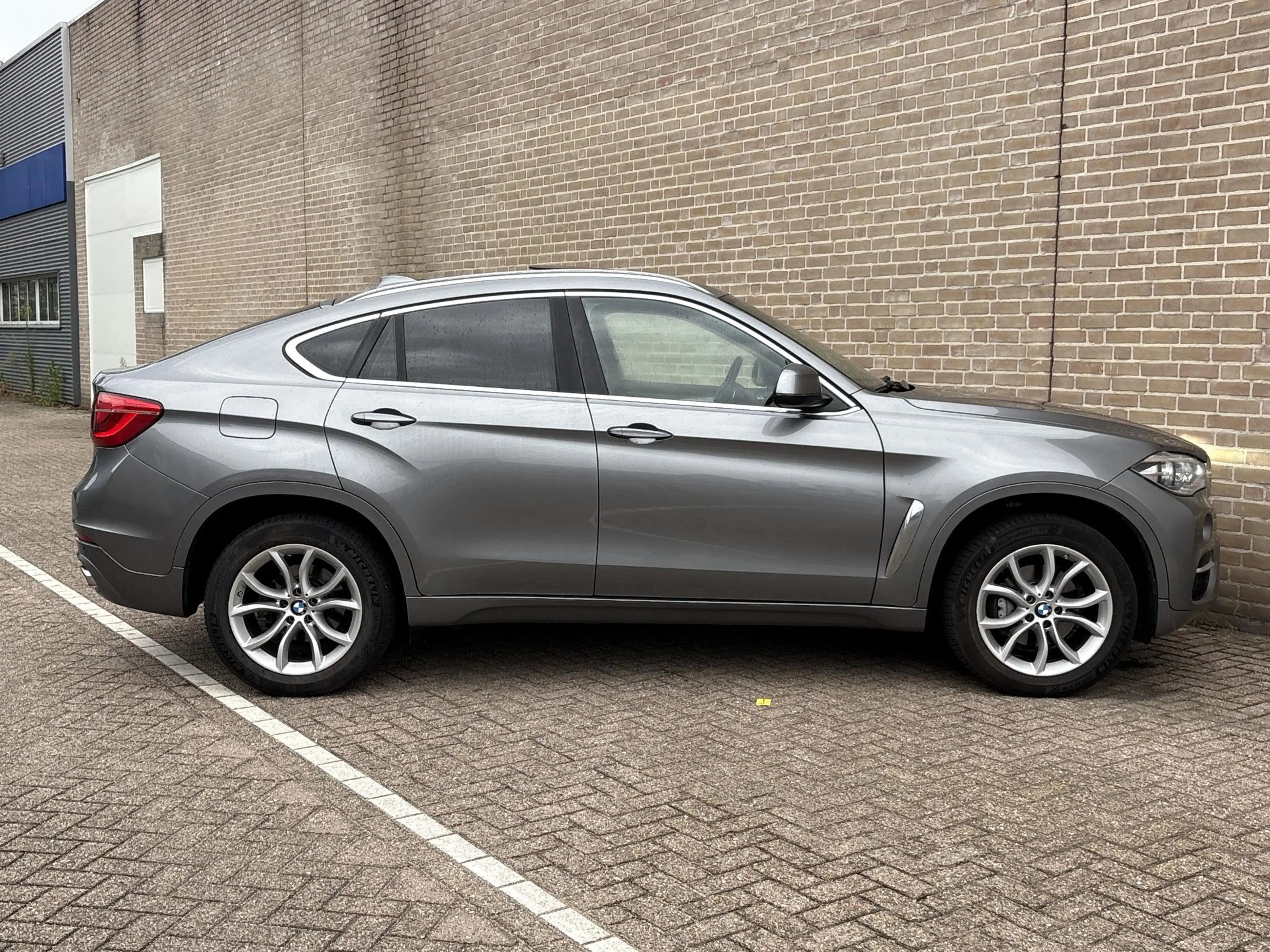 BMW X6 xDrive30d High Executive | Schuif/Kanteldak | Memo — photo 7