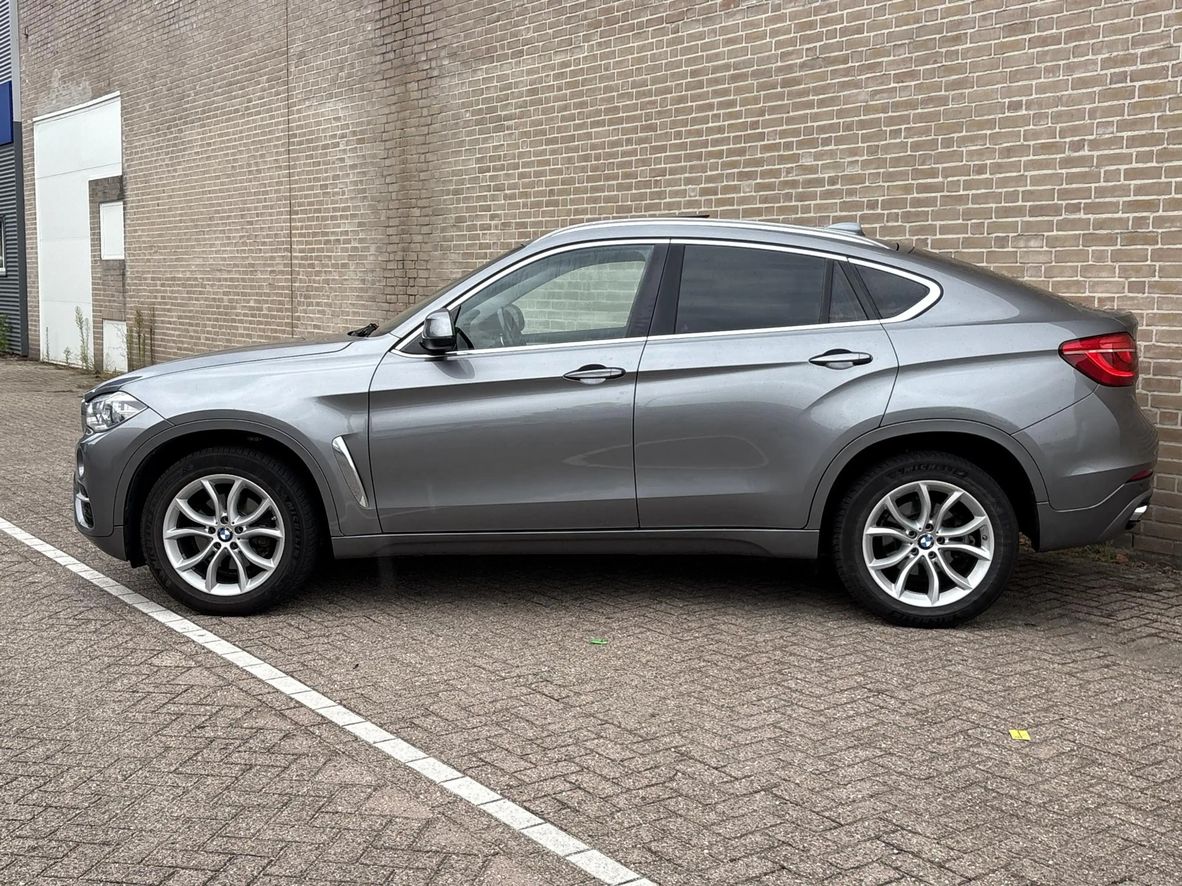 BMW X6 xDrive30d High Executive | Schuif/Kanteldak | Memo — photo 8