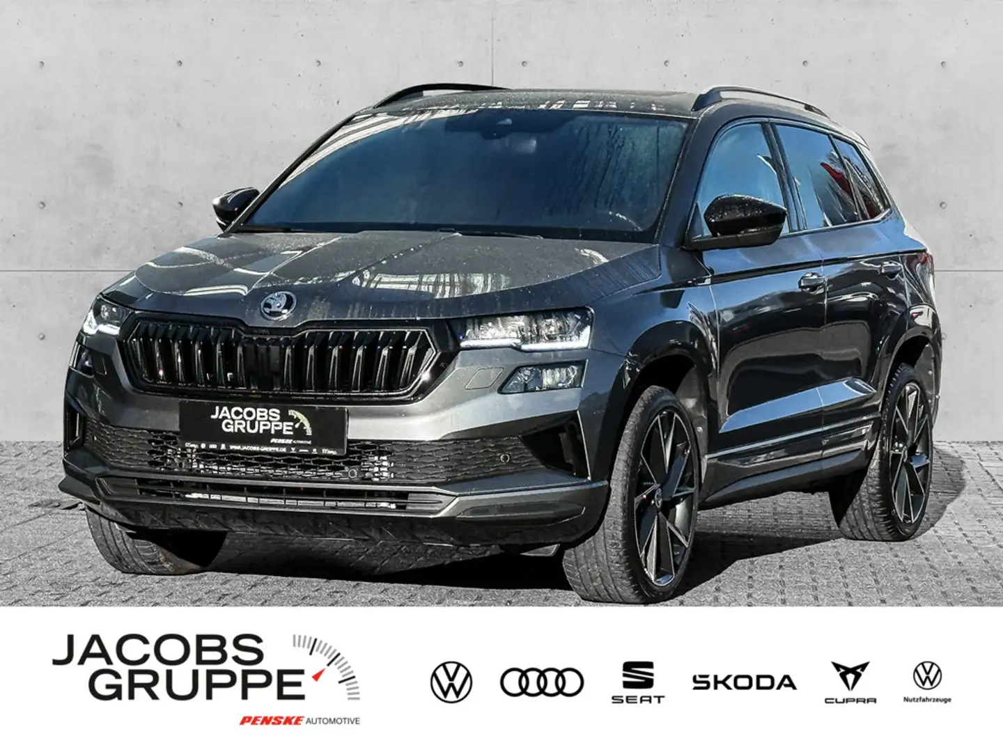Skoda Karoq 1.5 TSI DSG AHK/ACC/Pano/Matrix Sportline Grau - 1