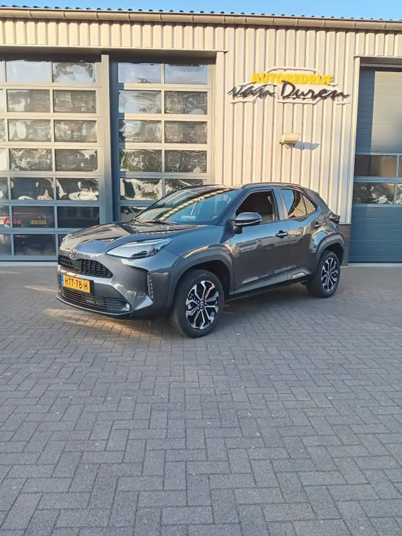 Toyota Yaris Cross 1.5 Hybrid 130 Business Plus  Groot Navi  Stoel/St Grijs - 1