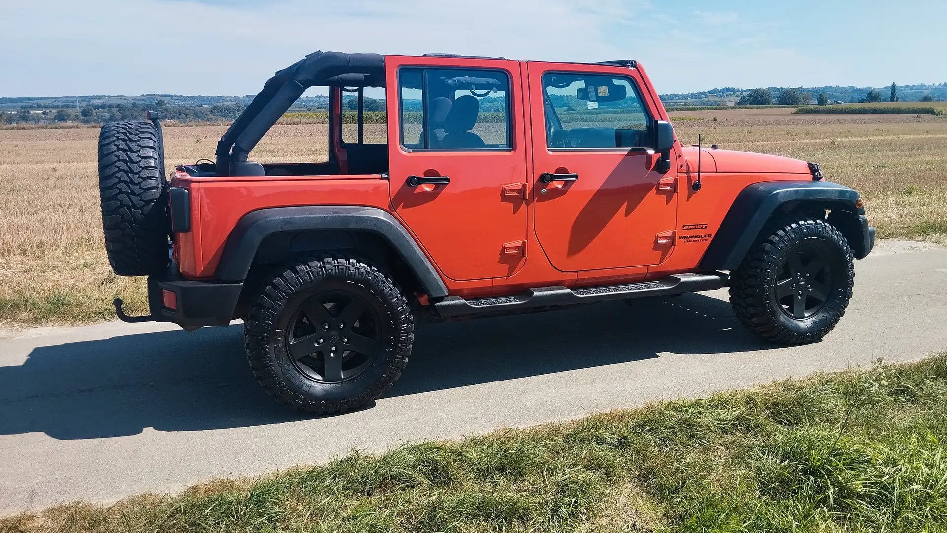 Jeep Wrangler Unlimited Sport 2,8 CRD Oranje - 1