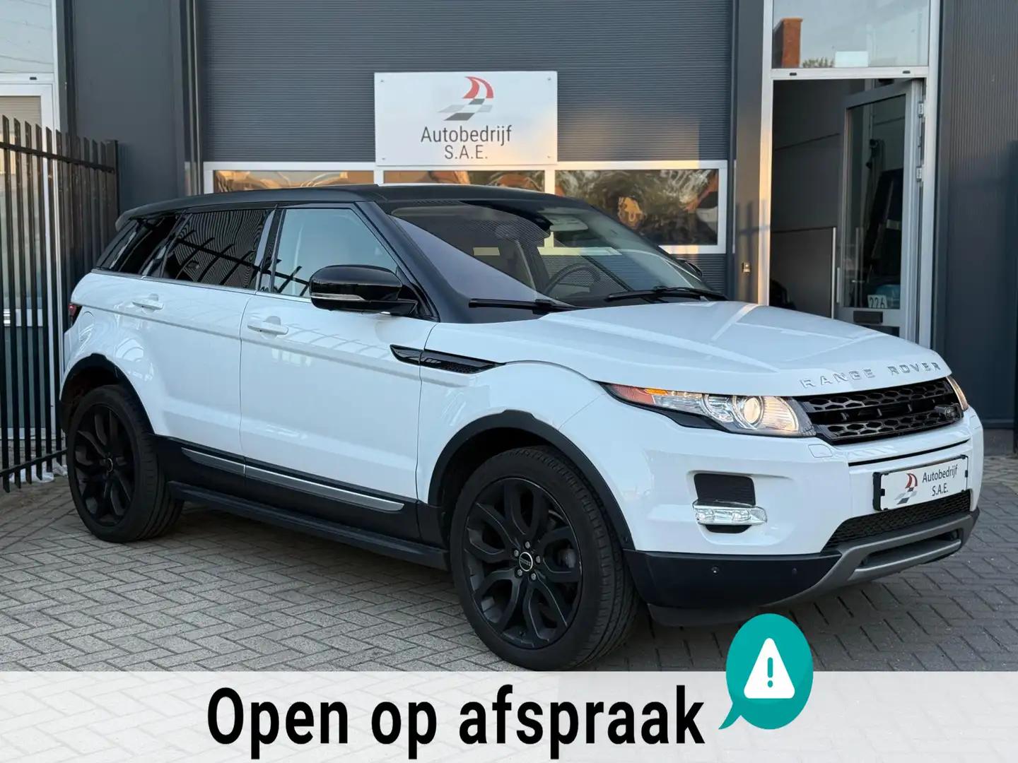 Land Rover Range Rover Evoque 2.0 Si 4WD Sicilian Yellow PANO LEDER SFEER 360 CA Wit - 2