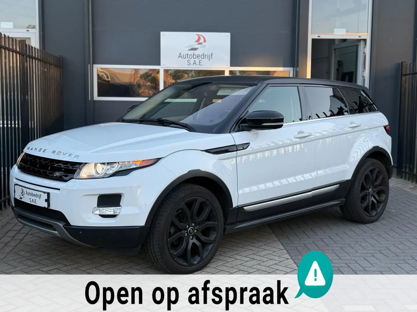 Land Rover Range Rover Evoque 2.0 Si 4WD Sicilian Yellow PANO LEDER SFEER 360 CA Wit - 1