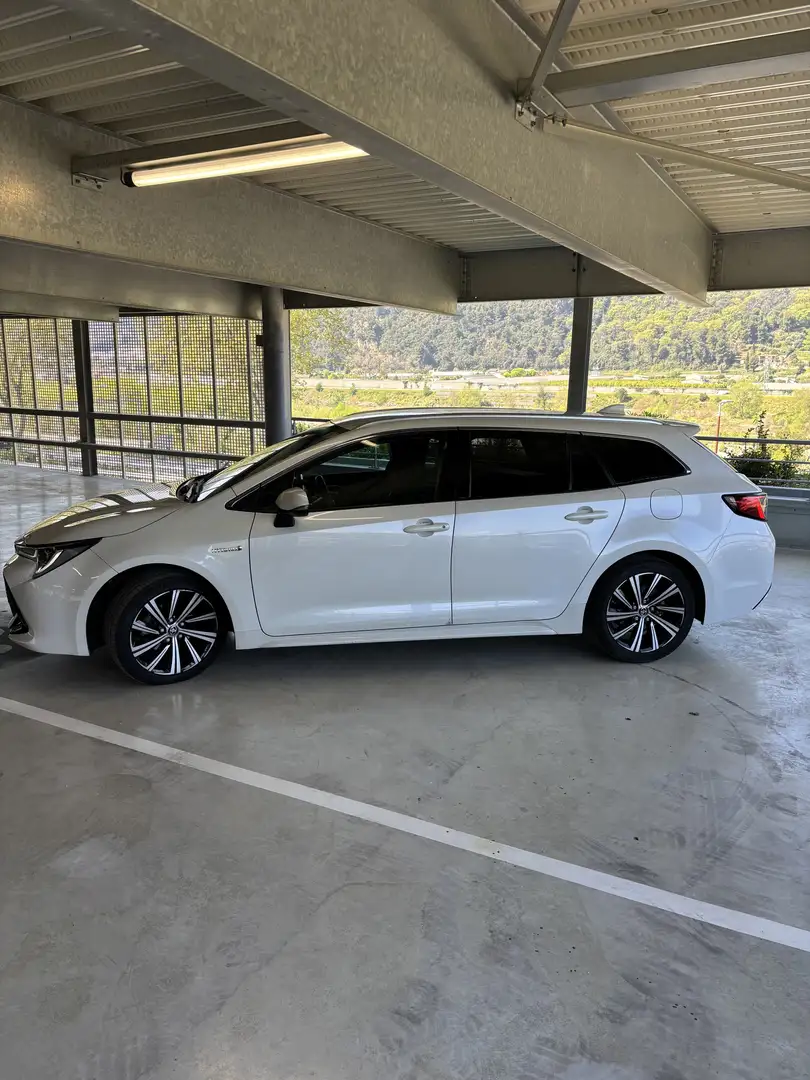 Toyota Corolla Corolla Touring Sports Pro Hybride 122h Dynamic Bu Blanc - 1