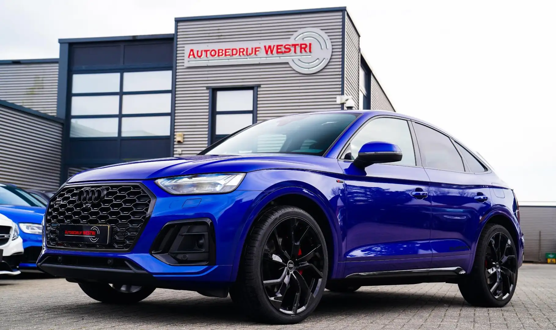 Audi Q5 Sportback 55 TFSI e S edition | Matrix | Luchtveri Bleu - 1