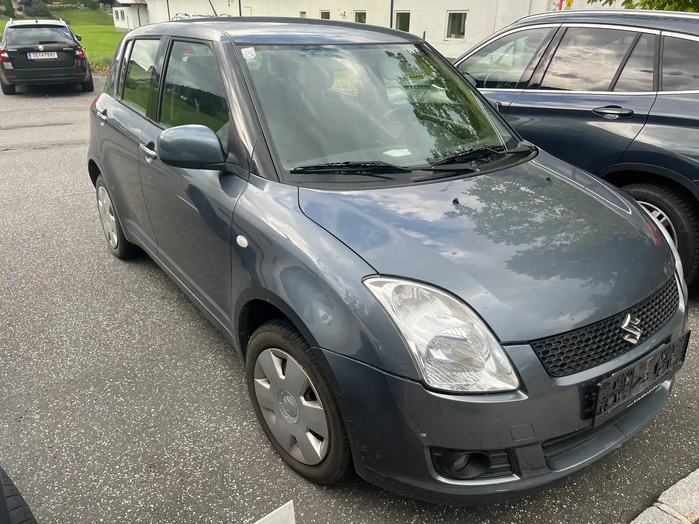 Suzuki Swift 1.3 GL 5DR 4 WD Grau - 1