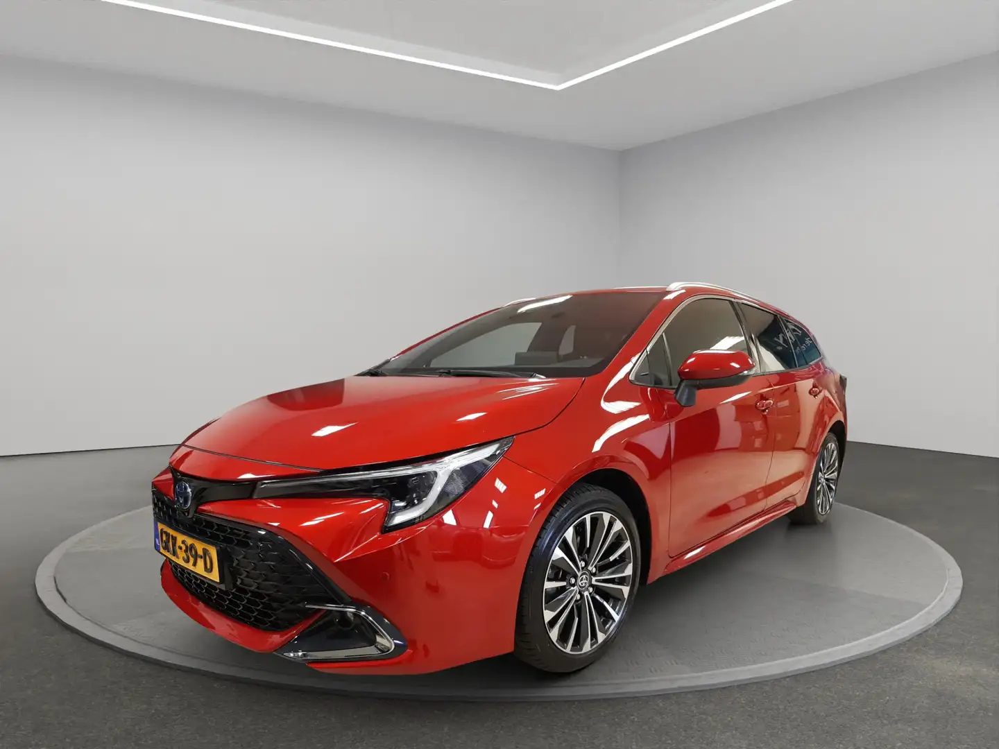 Toyota Corolla Touring Sports 1.8 Hybrid First Edition Adaptive C Rood - 1