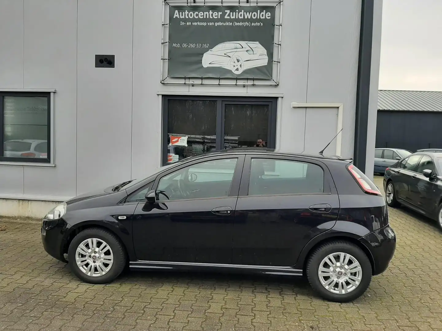 Fiat Punto Evo 0.9 TwinAir Edizione Cool airco cruise navi Zwart - 2