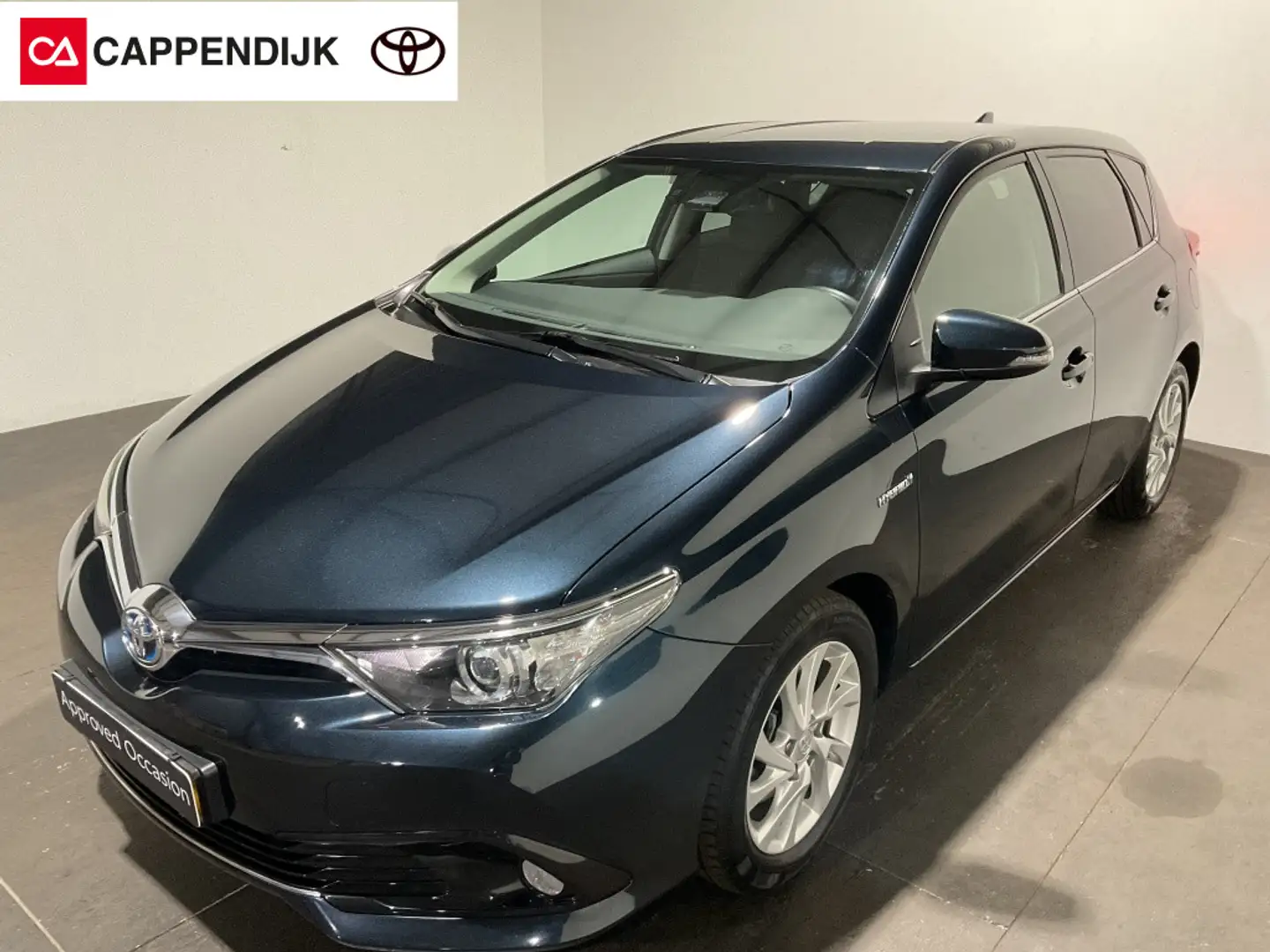 Toyota Auris 1.8 Hybrid Dynamic Go Grijs - 1