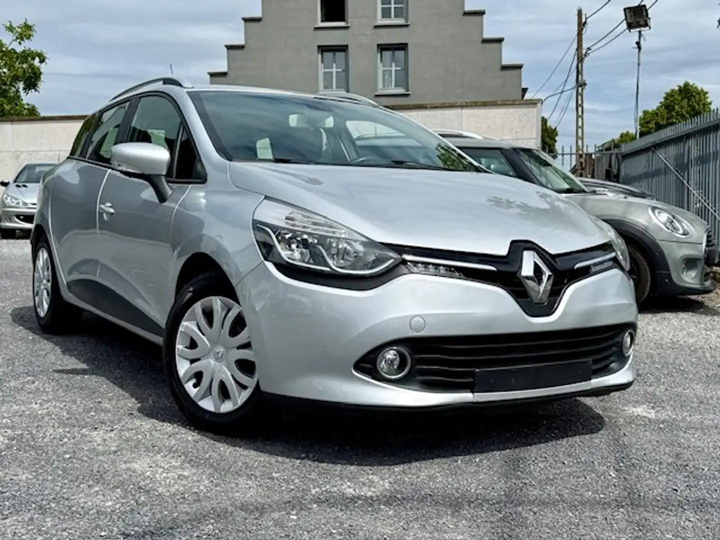 Renault Clio Clio 1.2 16V Grandtour NAVI AIRCO PDC CRUISE Zilver - 1