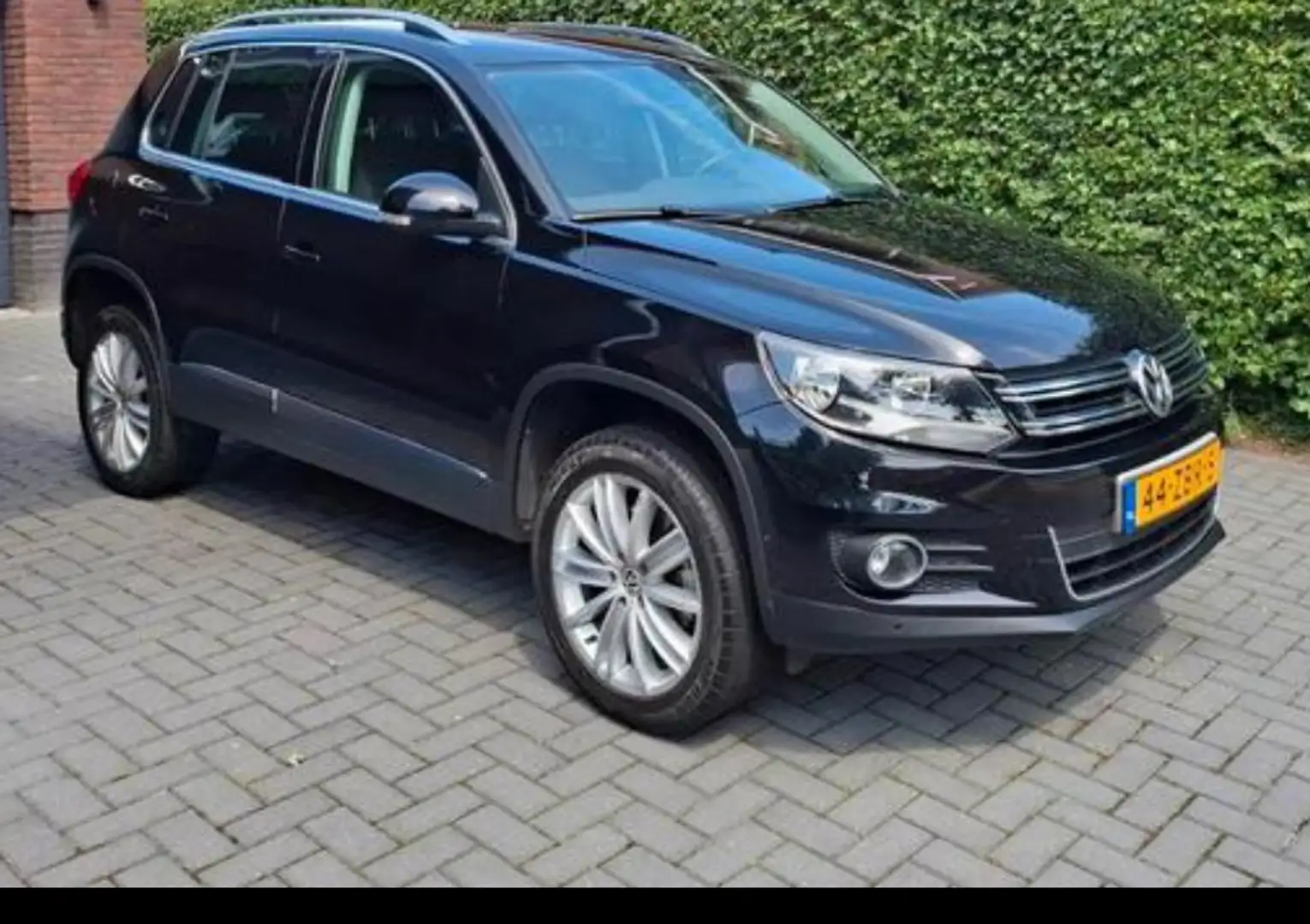 Volkswagen Tiguan 1.4 TSI Sport&Style Zwart - 1