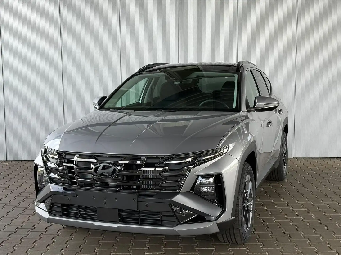 Hyundai TUCSON E-Motion 1.6 T-GDI 2WD 48V DCT / Panoramadach A... Silber - 1