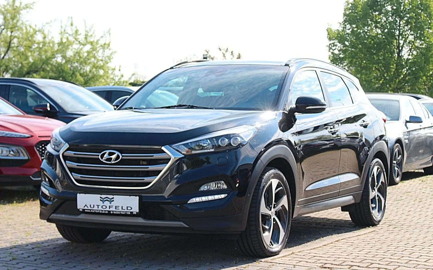 Hyundai TUCSON Premium 4WD/SHEFT/VOLLAUSS/LEDER/RCAM/LED Schwarz - 1