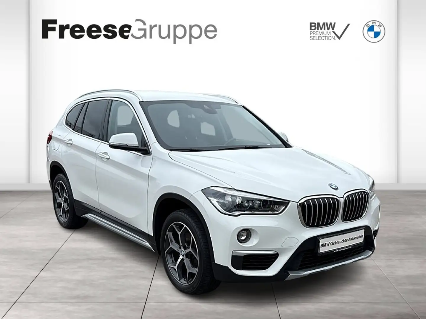 BMW X1 sDrive18i  xLine LED Navi Tempomat AHK schw. Wit - 1