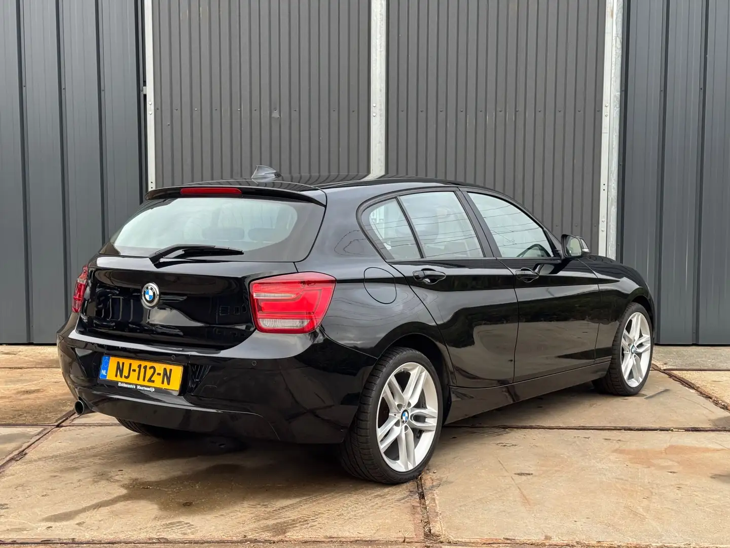 BMW 118 1-serie 118i High Executive Xenon | Navigatie | Cl Schwarz - 2