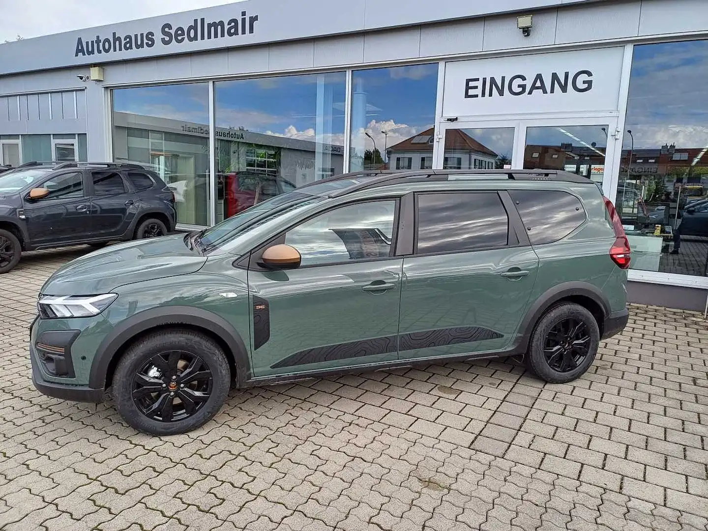 Dacia Jogger 1.6 HYBRID 140 Extreme+ 7-Sitzer/NAVI/SITZHEIZUNG/ Grün - 1