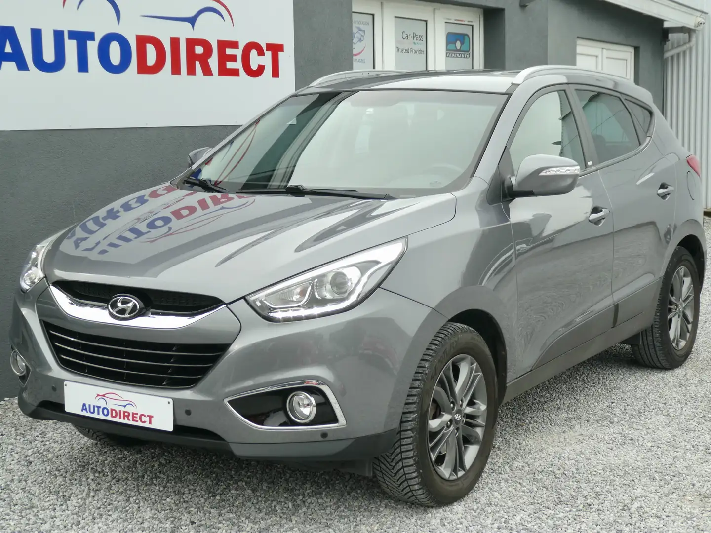 Hyundai iX35 1.6i 2WD Go! Cuir, Airco, Navi, Camera, PDC, Jante Gri - 1