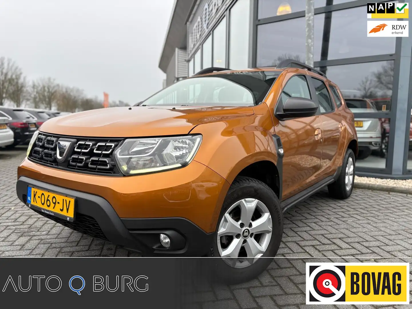 Dacia Duster 1.0 TCe Bi-Fuel Comfort | Trekhaak | Camera | PDC Orange - 1