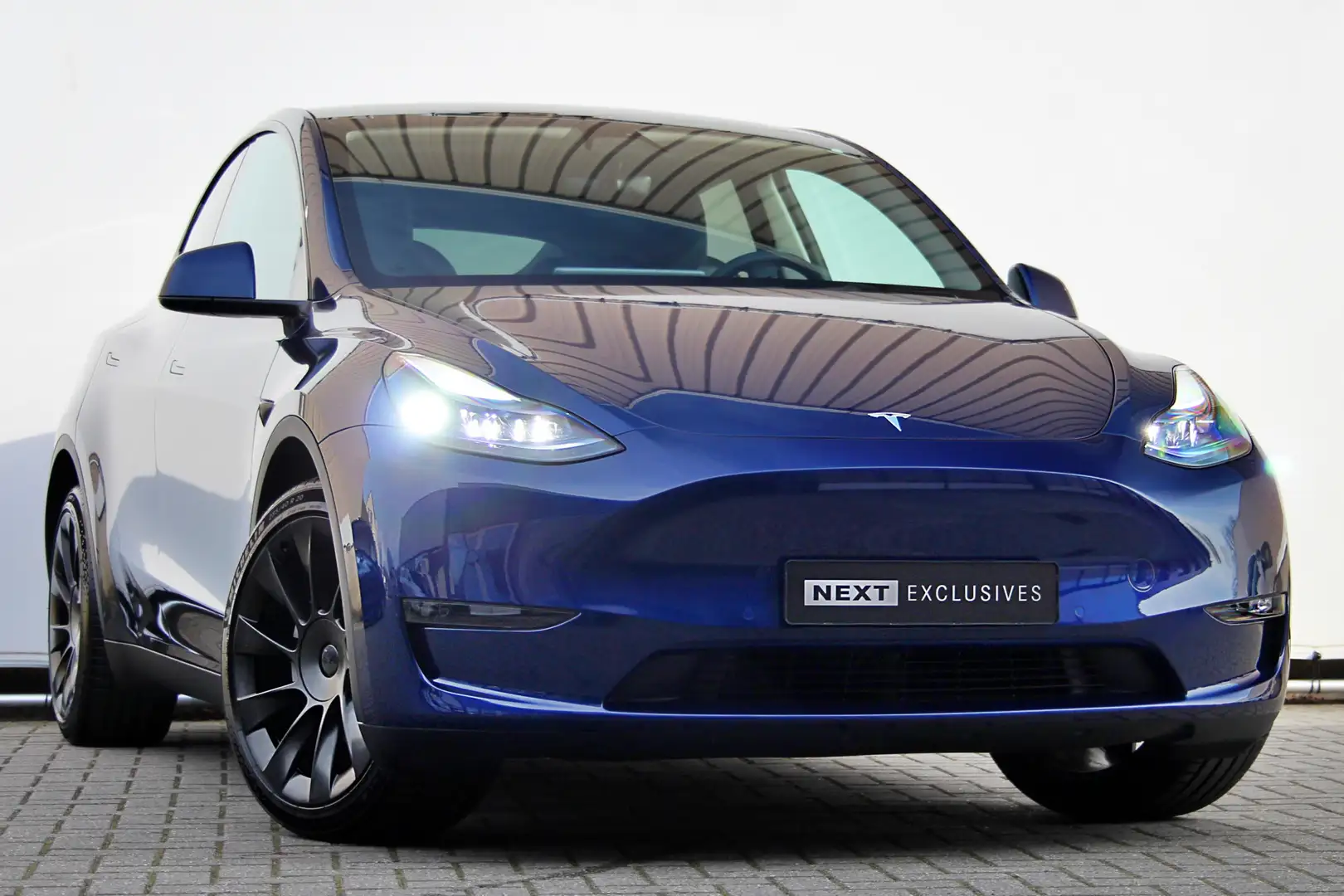 Tesla Model Y Long Range 75 kWh | BTW | Autopilot | Pano | ACC | Blauw - 1