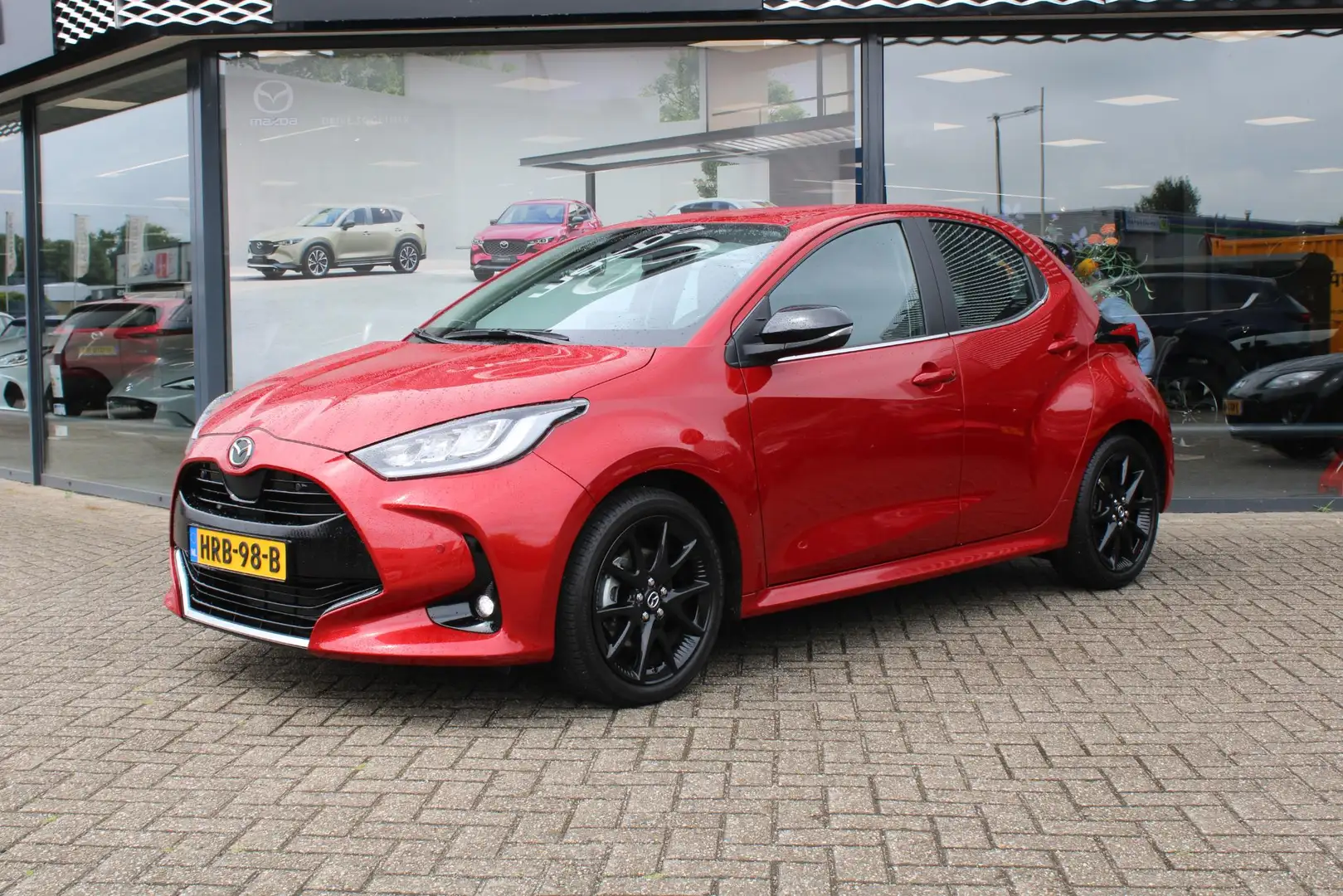 Mazda 2 Hybrid 1.5 Homura Automaat, Apple Carplay, Clima, Rouge - 2
