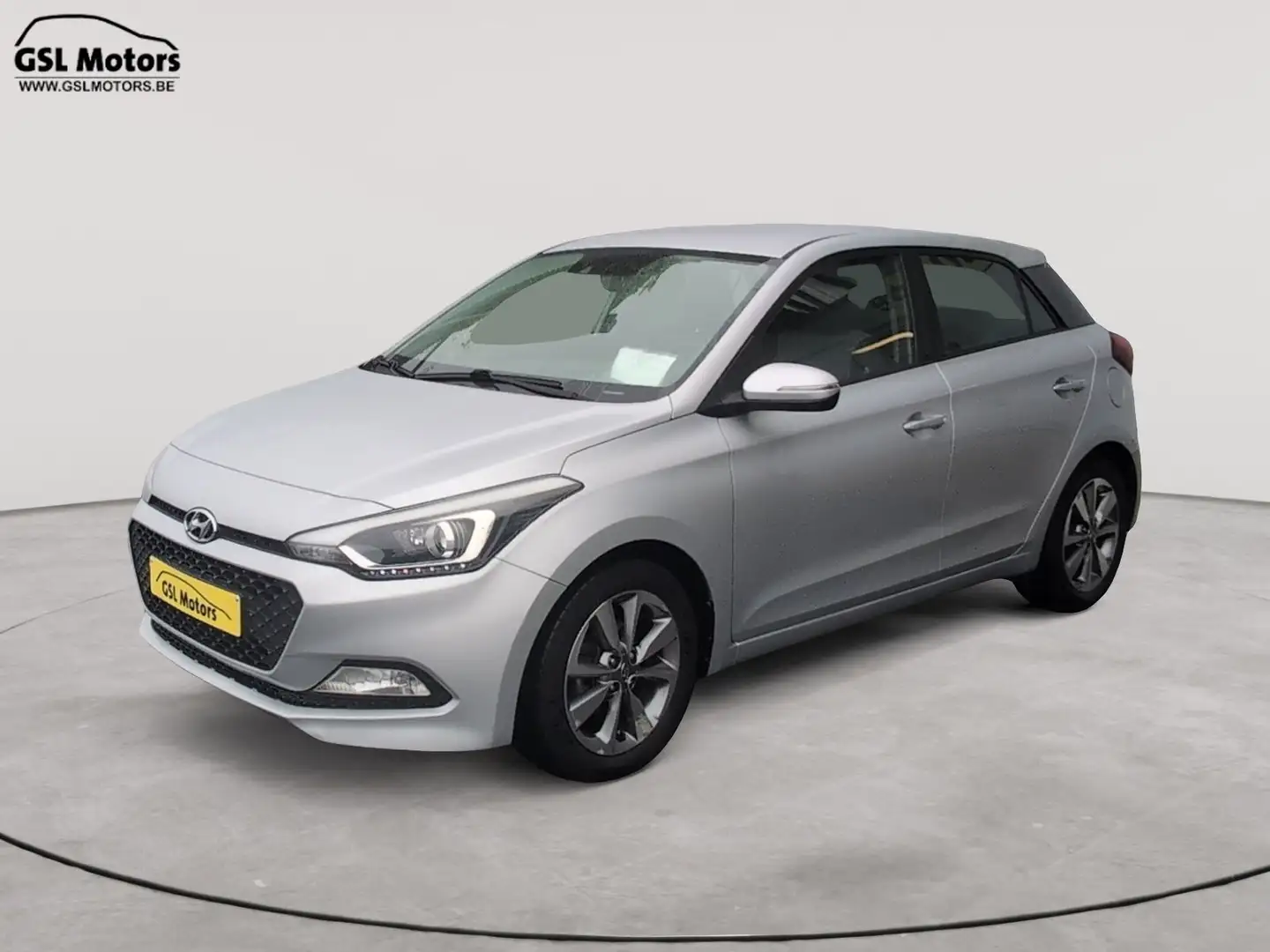 Hyundai i20 1.2i 84cv Grise alu 03/15 Airco Capteurs Bluetooth Argent - 1