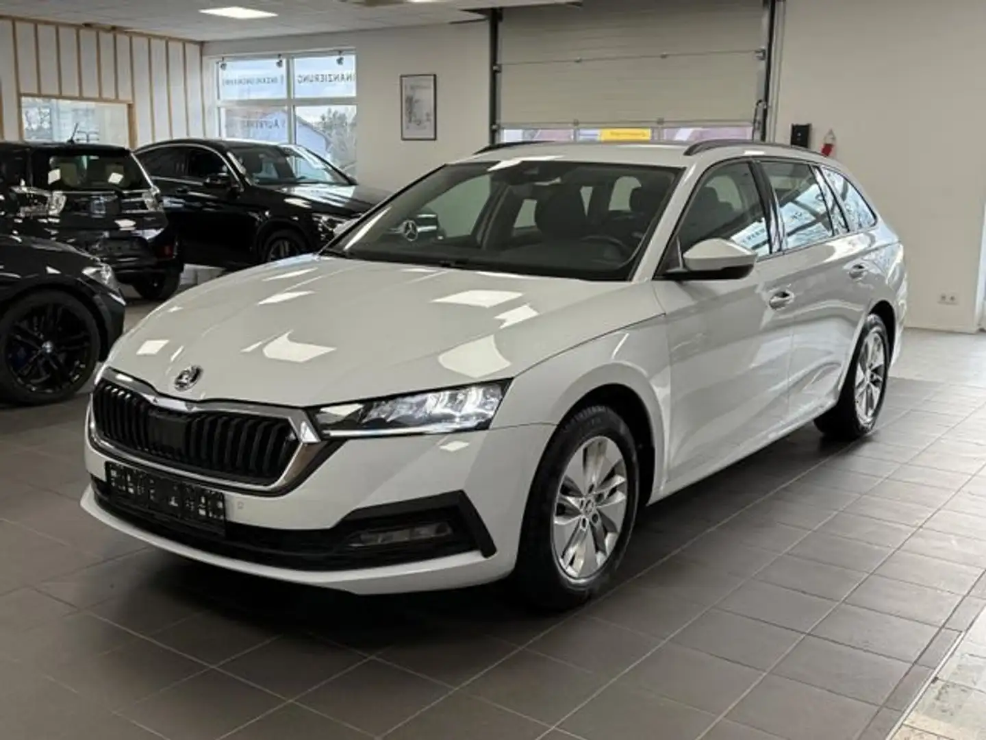 Skoda Octavia Skoda Octavia Combi Ambition 4x4/Garantie/Navi/TUV Weiß - 1