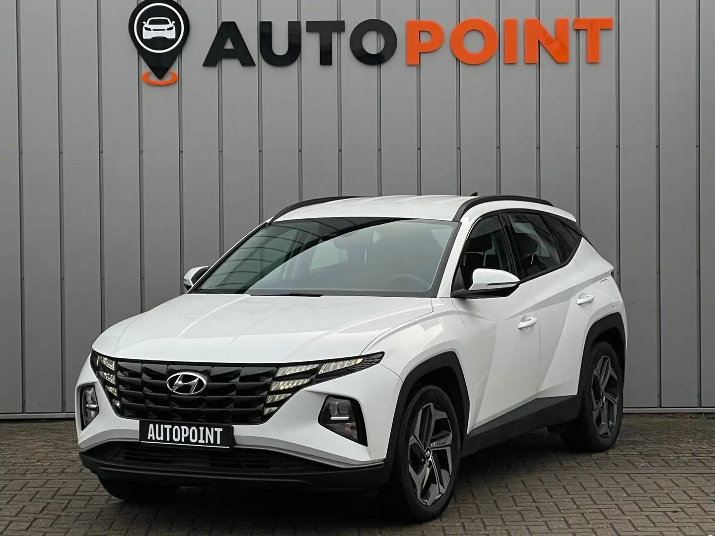Hyundai TUCSON 1.6 T-GDI PHEV 4WD 1E EIG DEALEROND|CAMERA|VIRTUAL Wit - 1