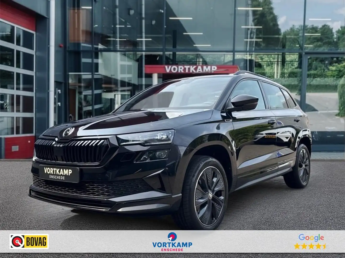 Skoda Karoq 1.5 TSI DSG SPORTLINE PANO-DAK/TREKHAAK/CAMERA/NAV Zwart - 1