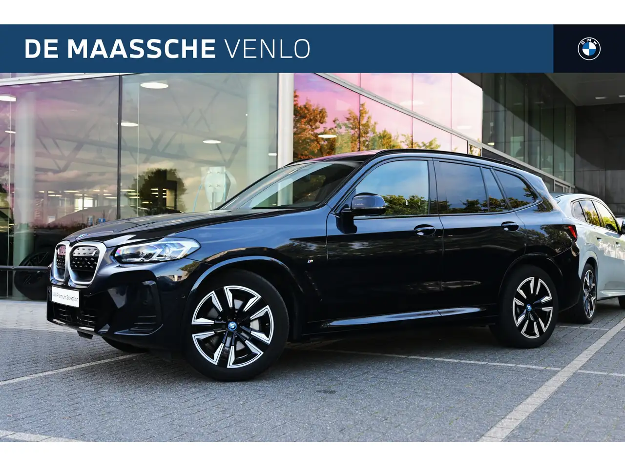 BMW iX3 Executive M Sport / Sportstoelen / Memory / Achter — photo 1 of 29