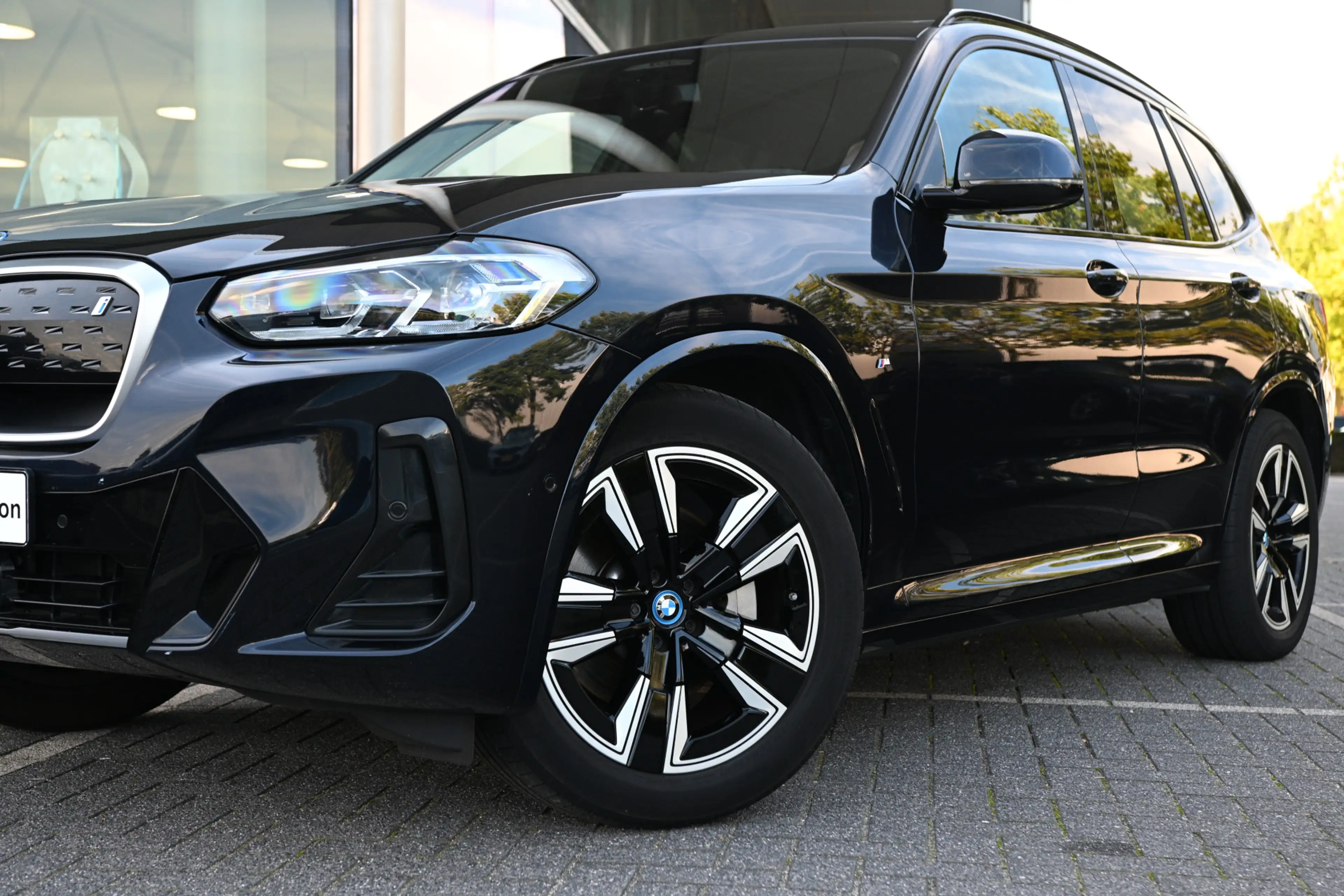 BMW iX3 Executive M Sport / Sportstoelen / Memory / Achter — photo 15