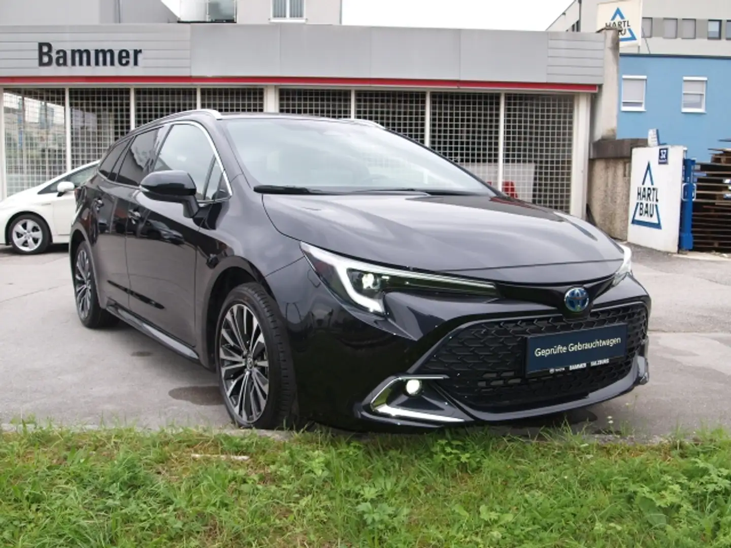 Toyota Corolla Corolla TS 1,8 HSD Active Drive Schwarz - 1