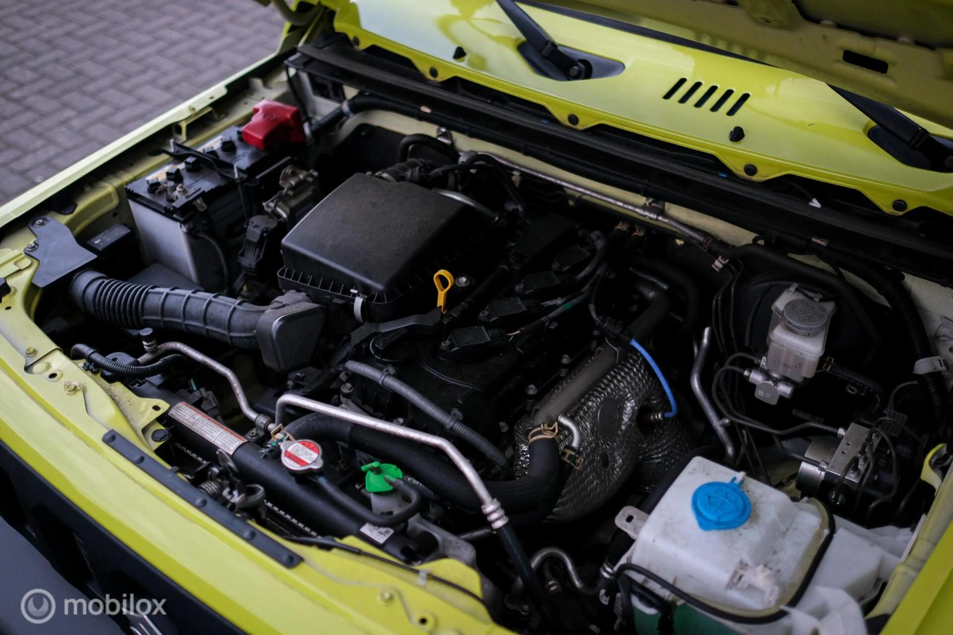 Suzuki Jimny 1.5 Comfort 4x4 | NL auto | NAP | 4 persoons | Sto — photo 17