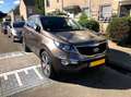 Kia Sportage 2.0 CVVT X-ecutive Plus pack 100% Dealer onderhoud Bruin - thumbnail 1