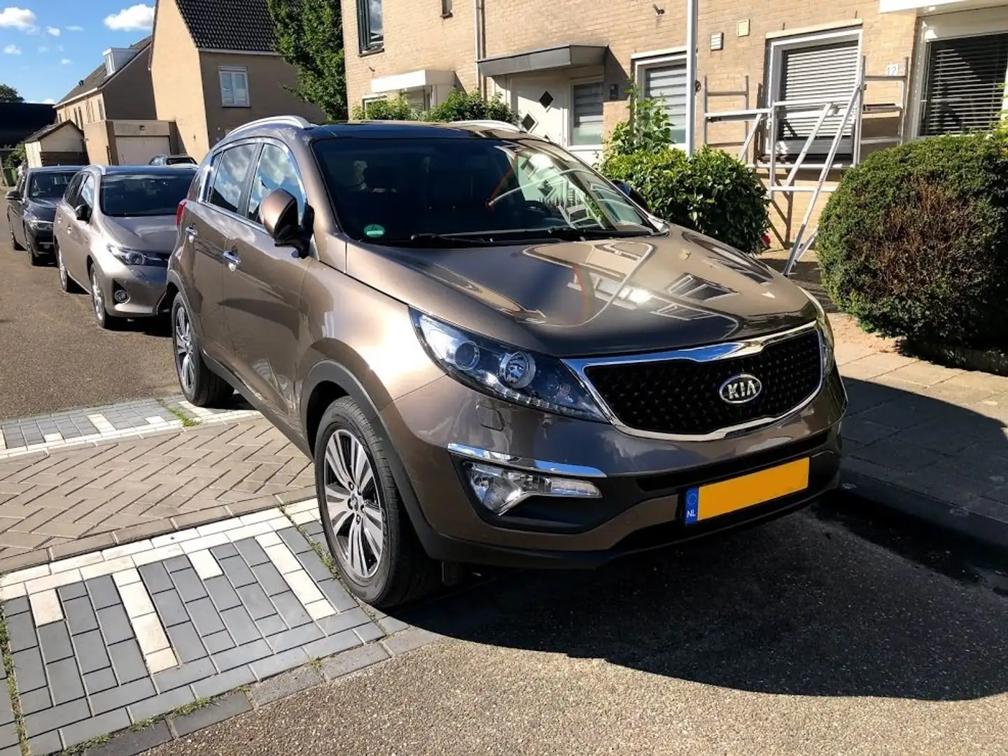 Kia Sportage 2.0 CVVT X-ecutive Plus pack 100% Dealer onderhoud Bruin - 1