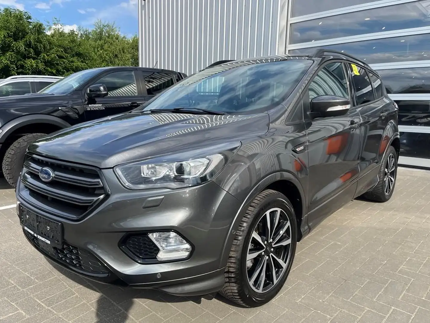 Ford Kuga 1.5 Benzine ST-Line M6 Ecoboost 150pk Camera & Nav Grijs - 1
